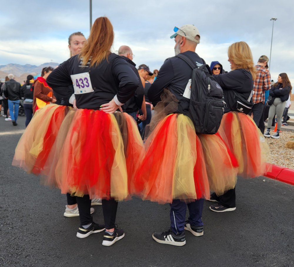 Runners in festive tutus at Jus Run Turkey Rock 2023