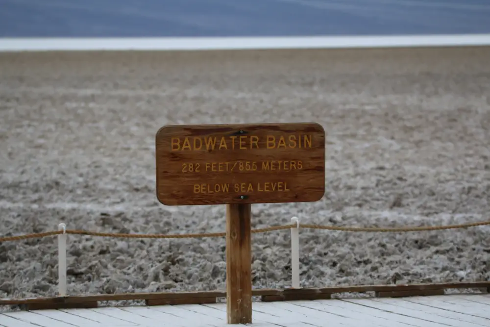 Sign at Badwater Basin, the midpoint of your Las Vegas to Death Valley day trip